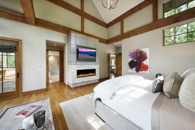 Beautifully Renovated Master Bedroom With a Striking Limestone Fireplace | Image 28