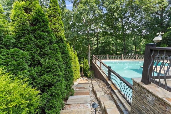 5610 Point West Dr, House other with 6 bedrooms, 7 bathrooms and null parking in Oakwood GA | Image 59