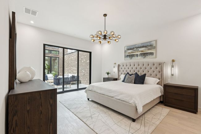 Primary Bedroom with sliders opening to courtyard | Image 13