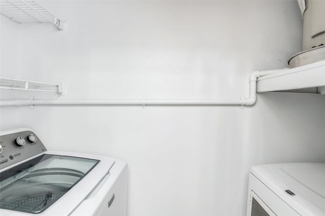 Laundry room with independent washer and dryer | Image 31