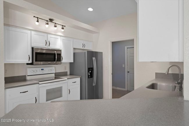 10101 Langan St, House other with 3 bedrooms, 2 bathrooms and null parking in Spring Hill FL | Image 16