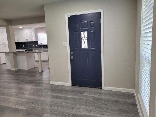 This house is very nicely put together with quality materials. The floor is luxury waterproof Vinyl. | Image 8