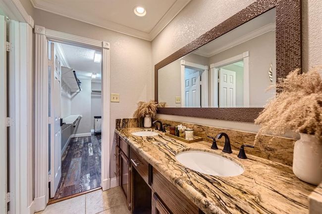 Primary bathroom and entrance to closet | Image 20