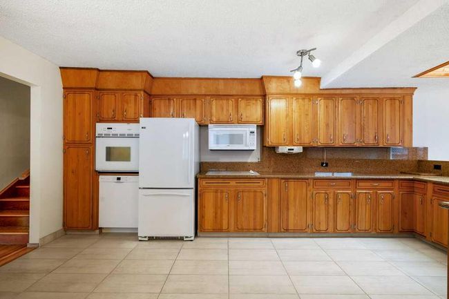 11408 Wilcox St Se, House other with 5 bedrooms, 3 bathrooms and 6 parking in Calgary AB | Image 11