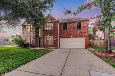 Nestled on a serene corner lot, this charming home offers a tranquilretreat from the hustle and bustle. | Image 2