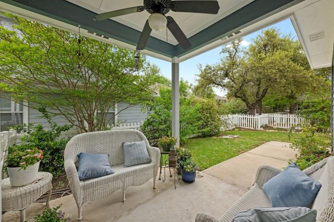 View of the cozy covered back patio. | Image 26