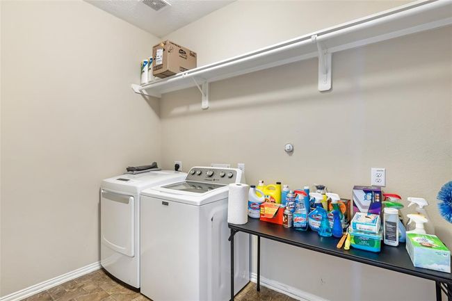 Utility room inside home on 1st floor. | Image 26