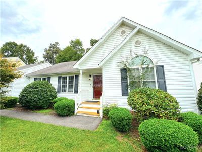 View of front of property with a front yard | Image 1