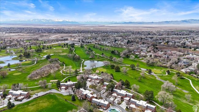 Birds eye view of property featuring view of golf course, a residential view, and a water and mountain view | Image 40