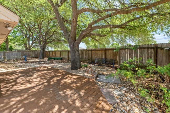Spacious & serene fully fenced back yard | Image 15