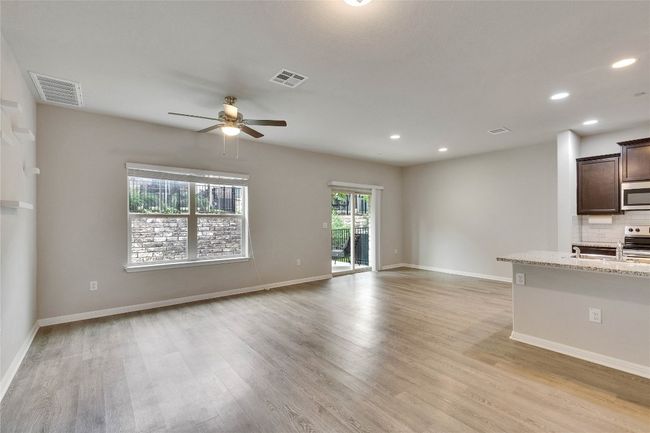 The open floor plan gives the feel of spaciousness | Image 6