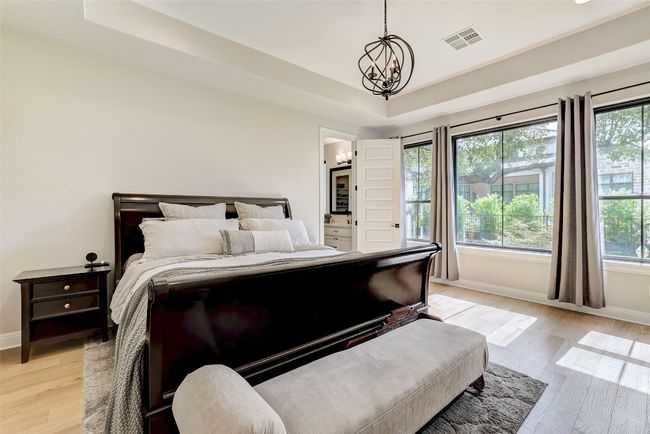 Primary bedroom with multiple windows | Image 13