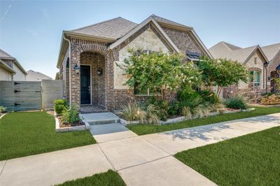 View of front of home featuring a front lawn | Image 1