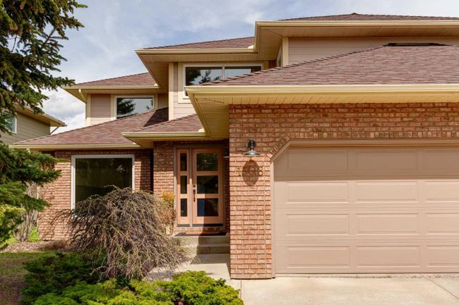 1508 Evergreen Hill Sw, Home with 5 bedrooms, 3 bathrooms and 6 parking in Calgary AB | Image 2