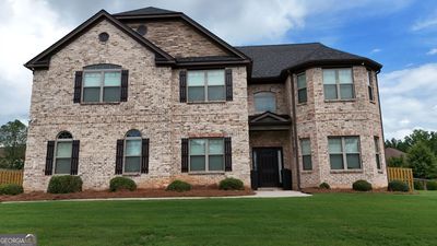 825 Bufflehead Court, House other with 6 bedrooms, 4 bathrooms and null parking in Stockbridge GA | Image 1