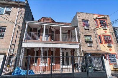 View of front facade featuring a balcony | Image 3