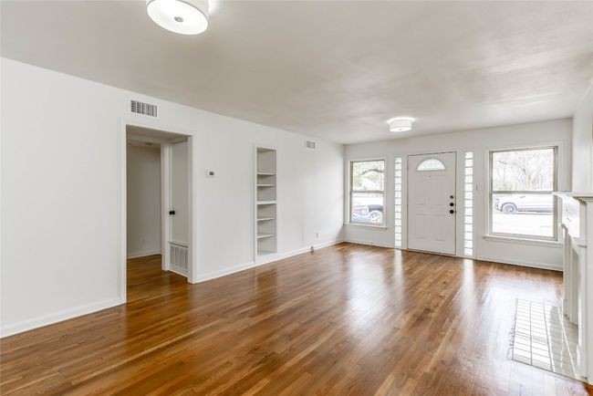 Entrance foyer with wood finished floors and baseboards | Image 29