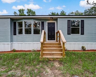 6738 Spanish Moss Drive, House other with 3 bedrooms, 2 bathrooms and null parking in Keystone Heights FL | Image 1