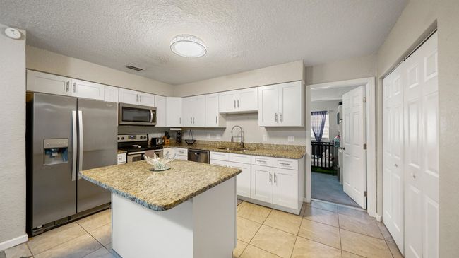 11428 Rustic Pines Cir E, House other with 4 bedrooms, 3 bathrooms and null parking in JACKSONVILLE FL | Image 6