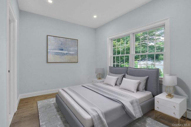 Bedroom featuring recessed lighting and wood finished floors | Image 13