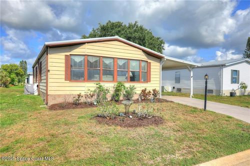 705 Hyacinth Cir, Barefoot Bay, FL, 32976-7664 | Card Image