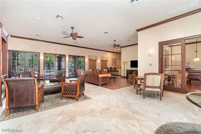 Living area featuring ornamental molding, a ceiling fan, and recessed lighting | Image 23