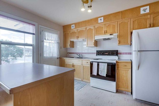 18 Poplar Cres, Home with 3 bedrooms, 2 bathrooms and 1 parking in Springbrook AB | Image 10