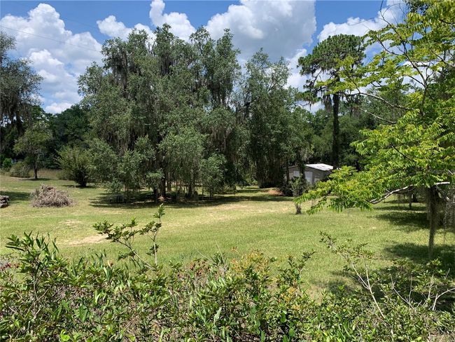 24645 Ne 177 Th Ter, House other with 2 bedrooms, 1 bathrooms and null parking in Fort Mc Coy FL | Image 63