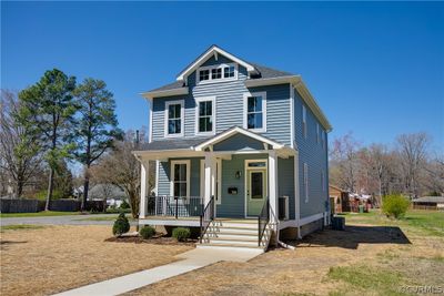 View of front of home with central AC unit and covered porch | Image 2