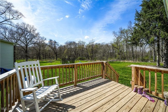 Deck featuring a lawn | Image 31