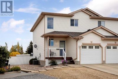 4005 69 A Street Close, Home with 3 bedrooms, 4 bathrooms and 2 parking in Camrose AB | Image 1