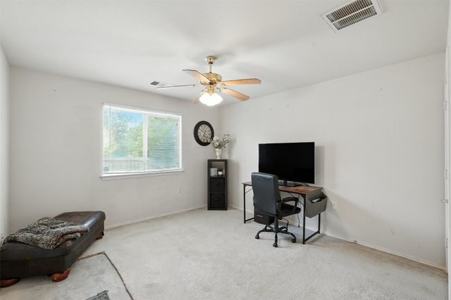 Office space featuring carpet flooring and ceiling fan | Image 17