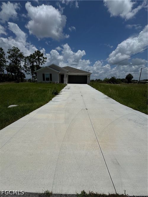 1609 Ne 33rd Ter, Cape Coral, FL, 33909-7306 | Card Image