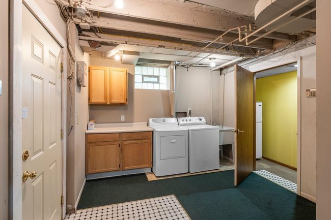The lower level in unit washer and dryer space is convenient and shareable. | Image 15