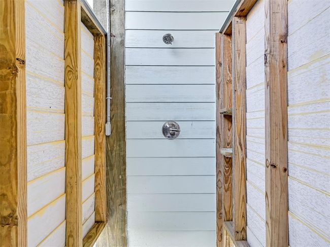 Rinse off after a day in the sand with the convenient outdoor shower—perfect for beachgoers and easy cleanup. | Image 29