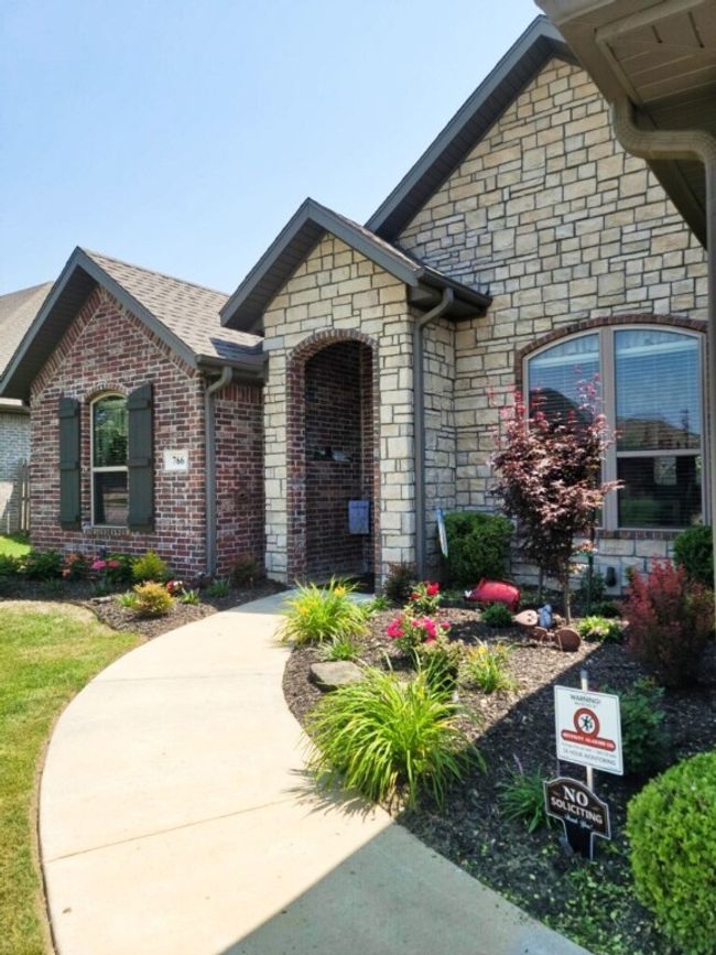 Seller would like for you to see the landscaping during the summer months. Just beautiful! | Image 6