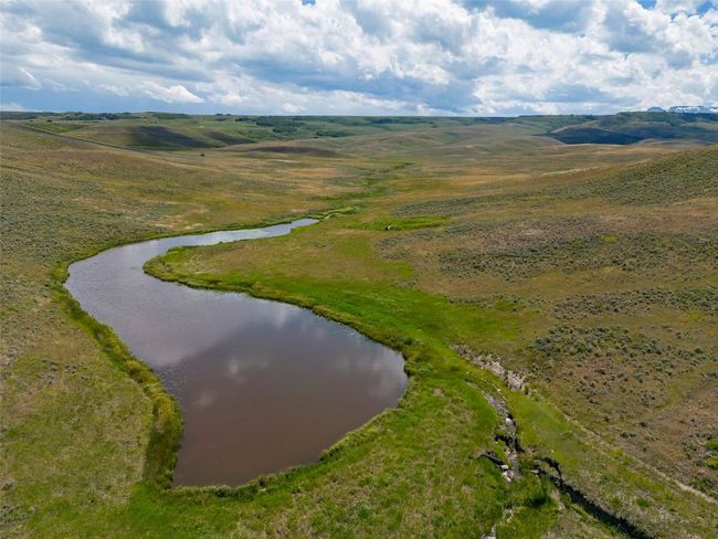 Drone / aerial view featuring a rural view and a water view | Image 8