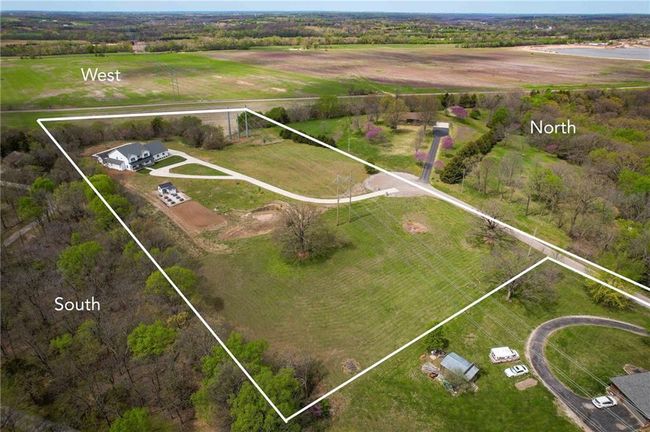 Aerial view of sparsely populated area with property boundaries highlighted | Image 63