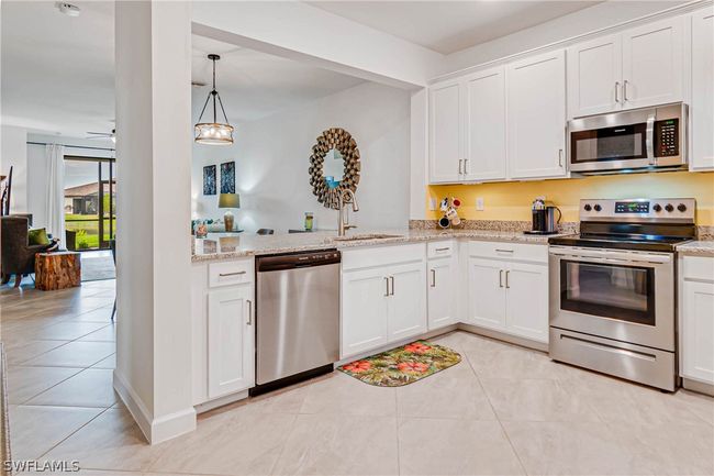 14008 Winding Cedar Way, House attached with 3 bedrooms, 2 bathrooms and null parking in FORT MYERS FL | Image 7