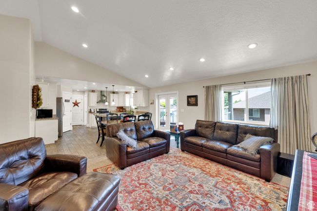 Living area featuring recessed lighting and lofted ceiling | Image 5
