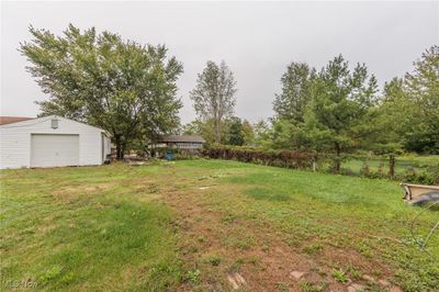 View of yard with an outbuilding and a garage | Image 3