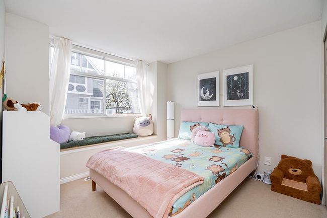 Bedroom with carpet floors and baseboards | Image 17