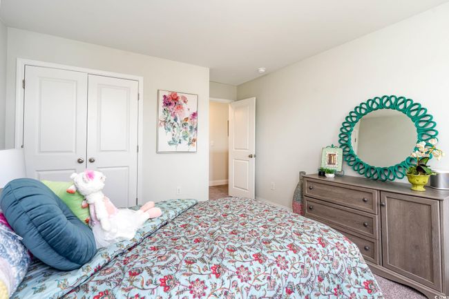 Bedroom featuring carpet floors and a closet | Image 26
