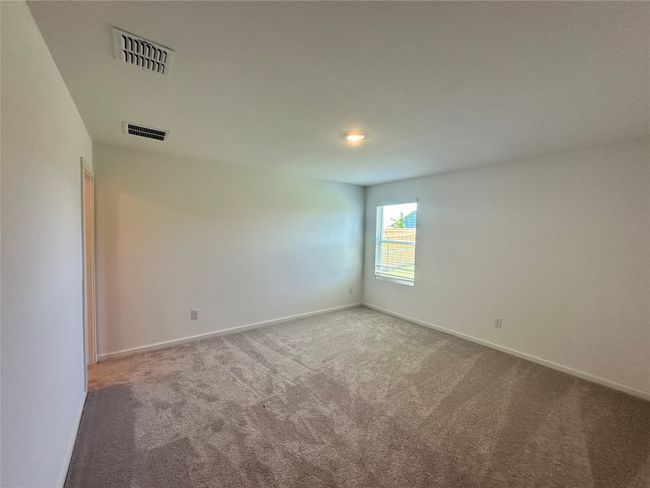Unfurnished room with carpet floors and baseboards | Image 13