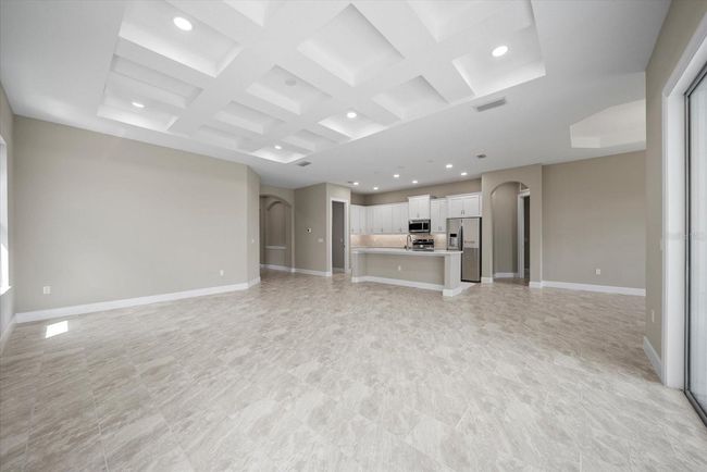 View of the open kitchen from the living space | Image 16