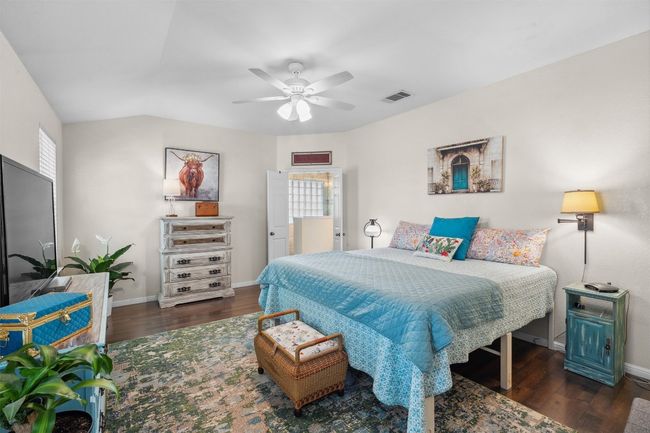 Large primary bedroom with backyard views | Image 23