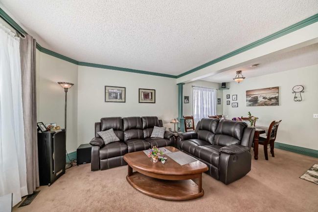 71 Taradale Drive Ne, Home with 4 bedrooms, 1 bathrooms and 3 parking in Calgary AB | Image 4