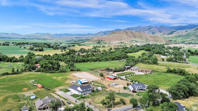 View of property location with a mountain backdrop and rural landscape | Image 74