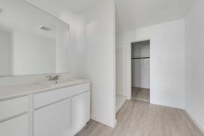 Bathroom with vanity and wood finished floors | Image 22