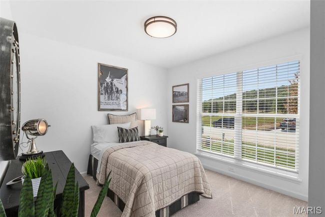 Bedroom with carpet and baseboards | Image 7